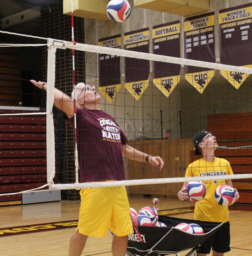 Coach Katarzynski participating in team drills during CUC Mens Volleyball practice on September 27th.