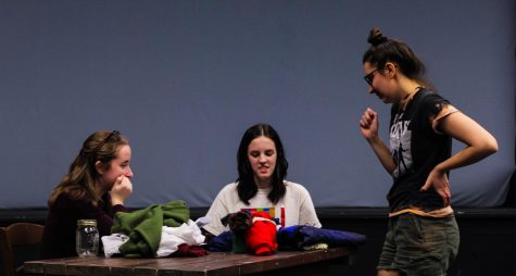 Actors Katherine Sievertz and Rachel Bachman discussing a scene with director Hannah Sochowski in preparation for this weekends performance of Trifles by Susan Glaspell.
