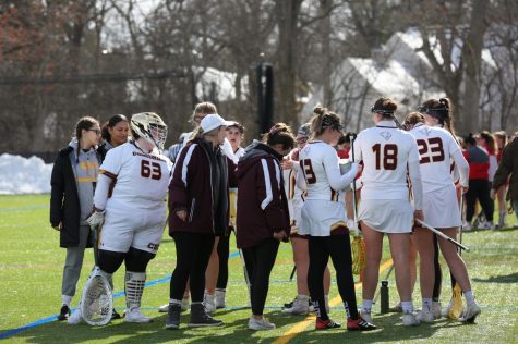 (Left to Right) Ryan McGee, Coach Scott, Coach Torres, Ella Herbig, Kelly and Lauren Saleh in a team huddle against Lake Forest College on February 18th.