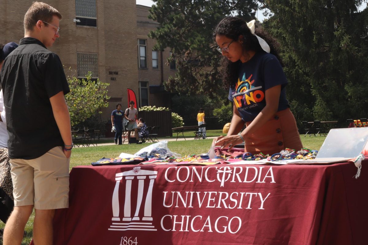 Sophomore Tyler Trickey and Latino Student Union president Alexis Holliday, a junior, at the CUC Student Involvement Fair on Sept. 6.