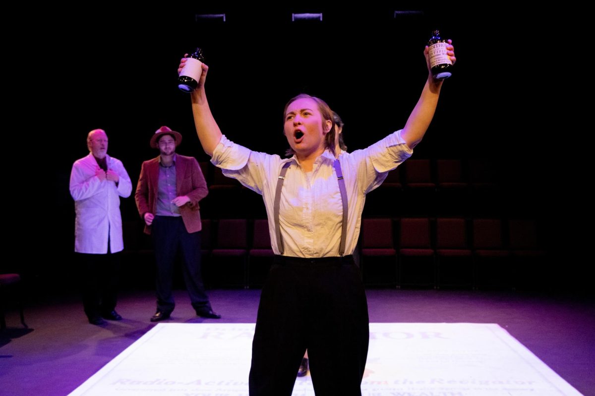 (left to right) Michael Hadler, Eduardo Hinds, and Evallyn Berg rehearsing for the fall play "Radium Girls" in the Bergmann Theater