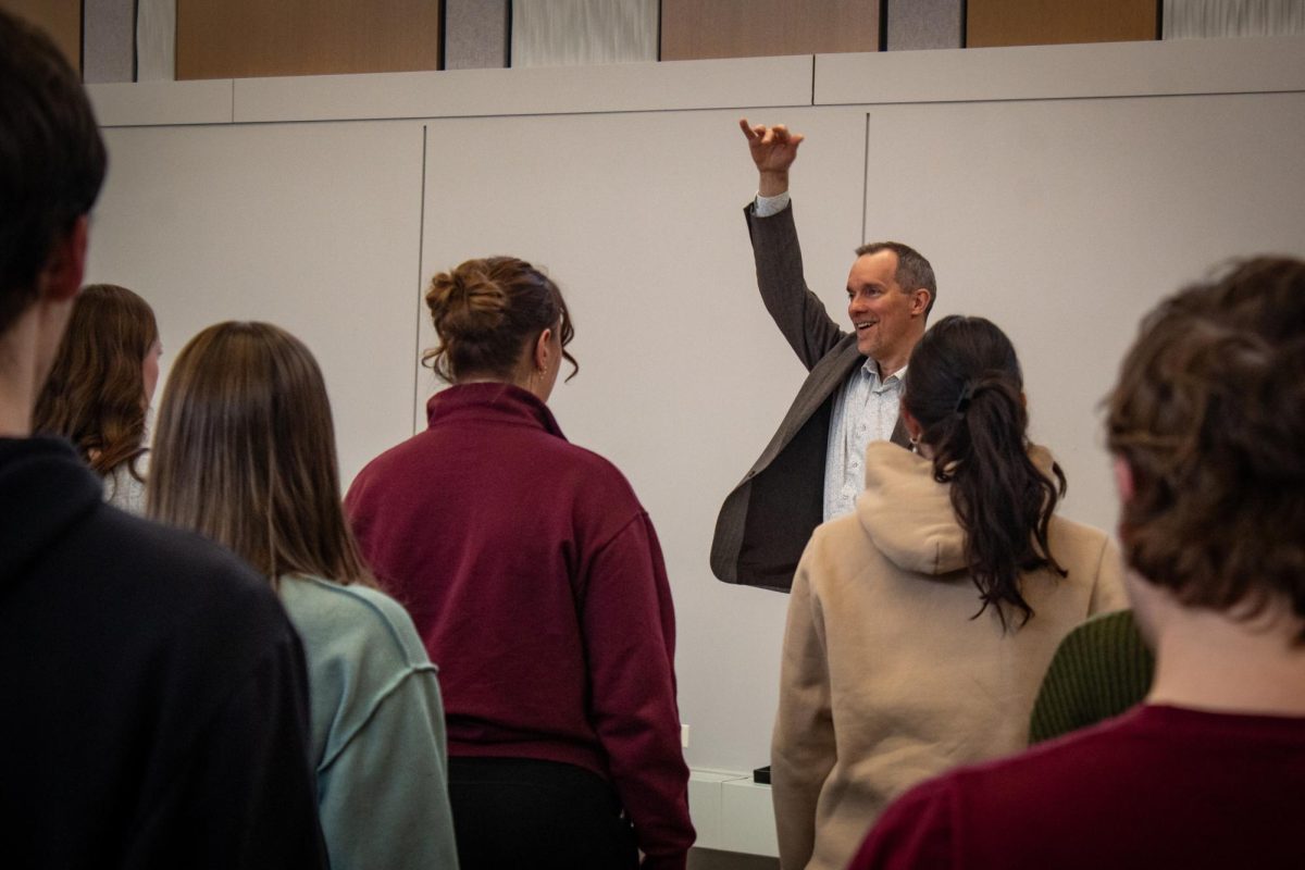 Dr. Charles Brown conducts Kapelle rehearsal on Feb. 18. 