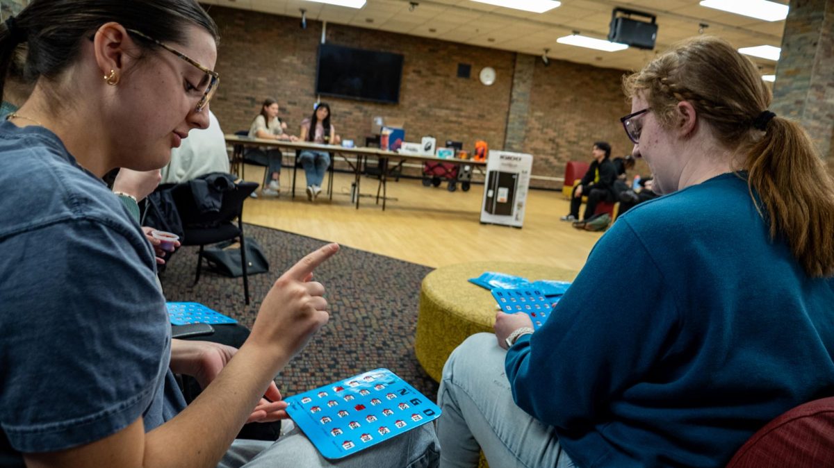 Students participating in a Bingo Night held in the Cougar Den
