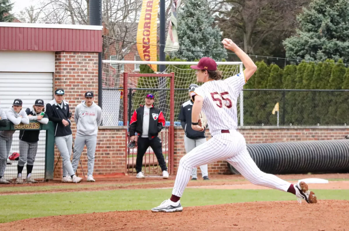 Dylan Scott pitching versus Edgewood University