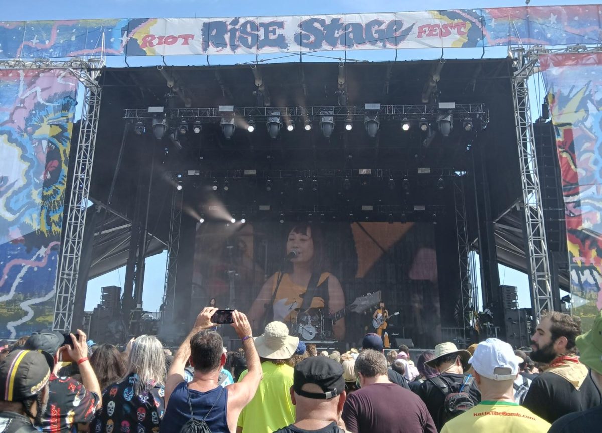Festivalgoers at Riot Fest listen to Shonen Knife, the first group to perform on Riot Fest weekend.