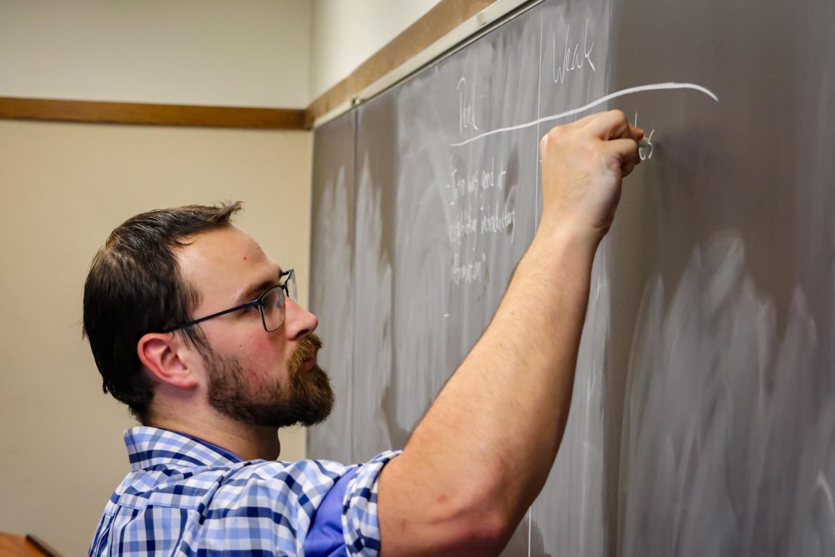 CUC English professor Anton Jones teaches Intro to Creative Writing class on Nov. 19. 