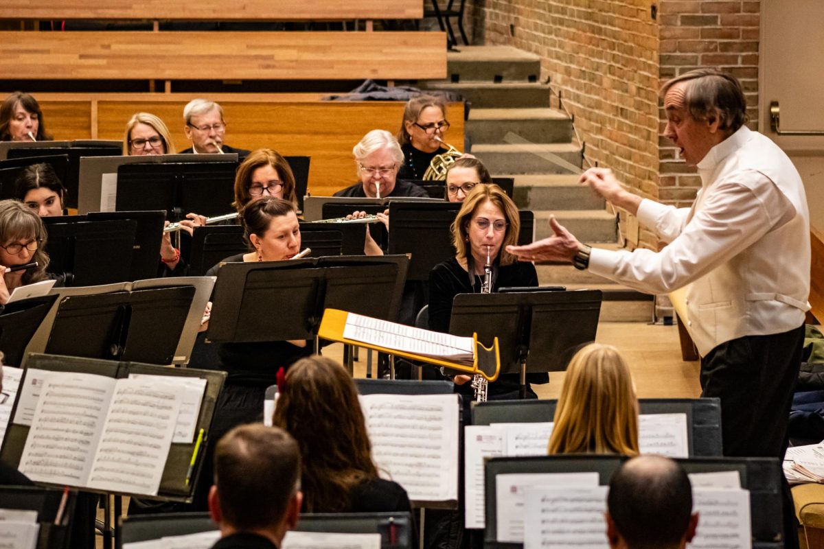 "Doc" Fischer conducting the University Band for the last time before his retirement on December 5th. 