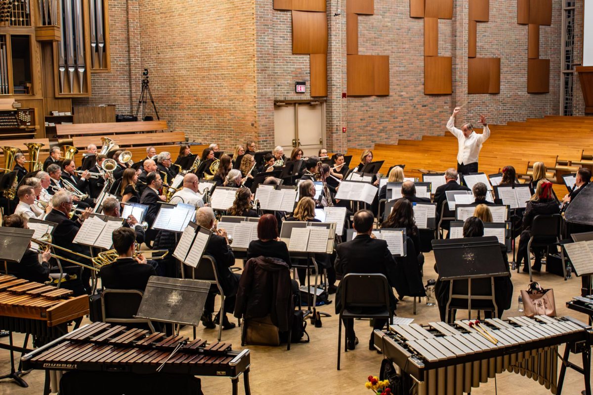 "Doc" Fischer conducting the University Band for the last time before his retirement on December 5th. 